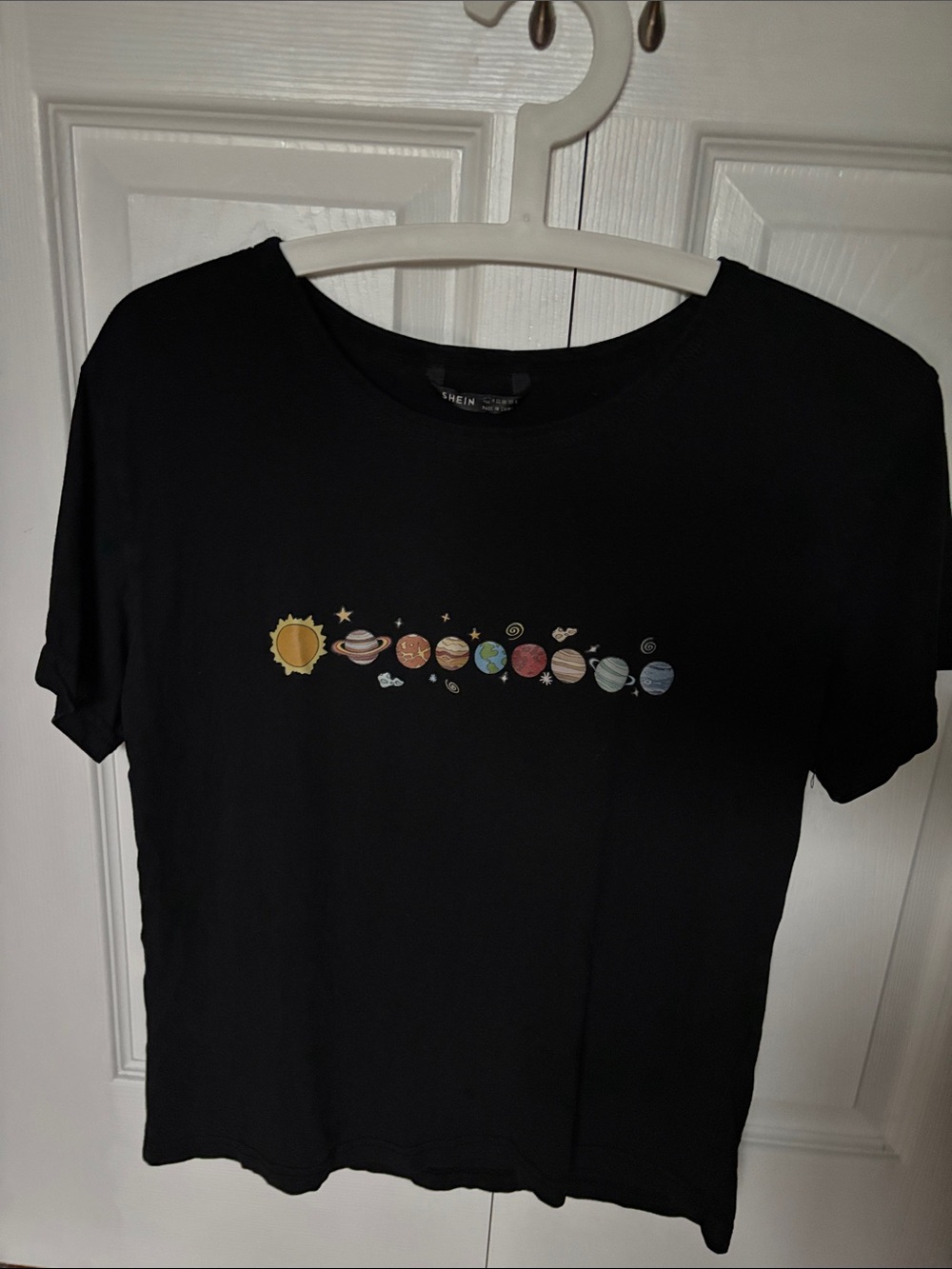 Black Short-Sleeve Tee with Colourful Planet Graphic. 100% Cotton 🌏🪐🌎🌍☀️🌕